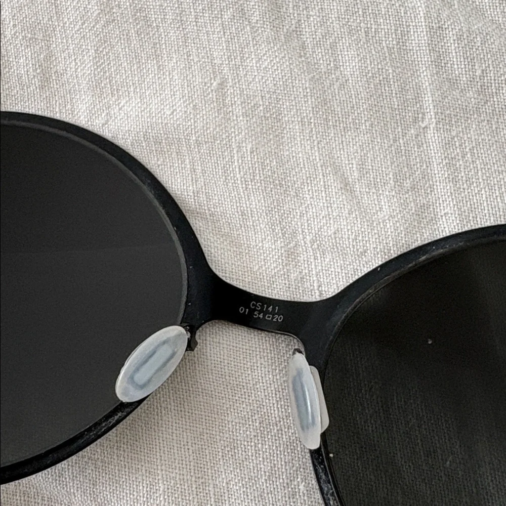 Black Round Women's Titanium Sunglasses